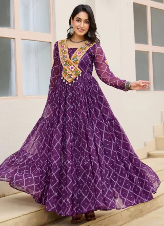 Auspicious Purple Faux Georgette Gown with Patch Border and Print Work