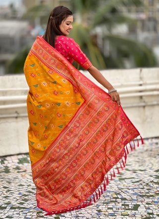 Awesome Yellow Patola Silk Trendy Saree with Meenakari and Woven Work