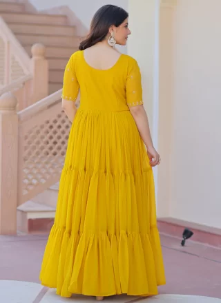 Beads and Embroidered Work Faux Chiffon  Designer Gown In Mustard Colour
