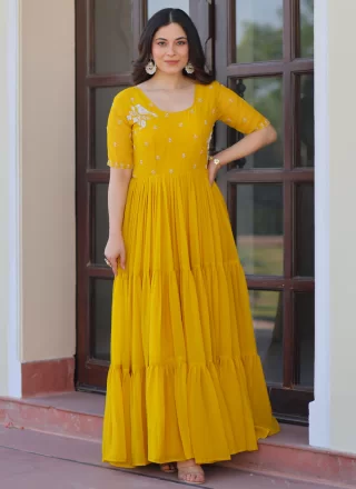 Beads and Embroidered Work Faux Chiffon  Designer Gown In Mustard Colour