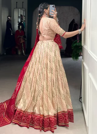Cream Silk Bandhej, Lace and Print Work Lehenga Choli for Ceremonial