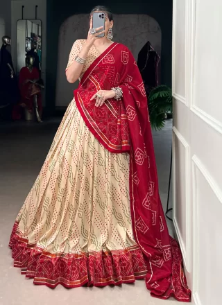 Cream Silk Bandhej, Lace and Print Work Lehenga Choli for Ceremonial