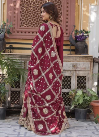 Embroidered and Sequins Work Faux Georgette Gown In Maroon for Festival