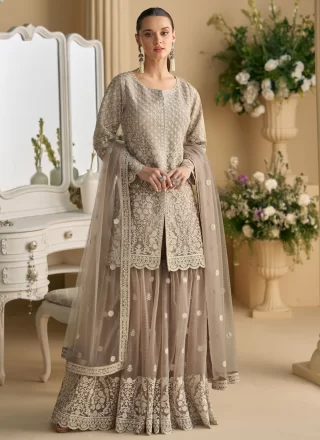 Embroidered and Stone Work Net Palazzo Salwar Suit In Brown Color