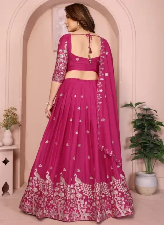 Embroidered and Zari Work Georgette A - Line Lehenga Choli In Rani