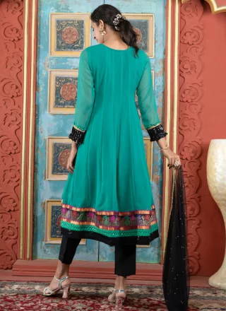 Embroidered, Jacquard, Lace and Zari Work Georgette Salwar Suit In Turquoise Color