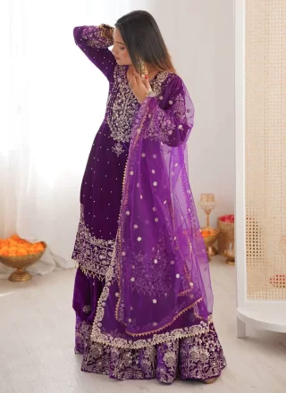 Embroidered, Pearls, Sequins and Thread Work Velvet Salwar Suit In Purple for Festival