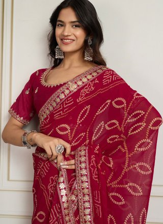 Embroidered, Print, Sequins and Zari Work Georgette Designer Sari In Rani for Casual
