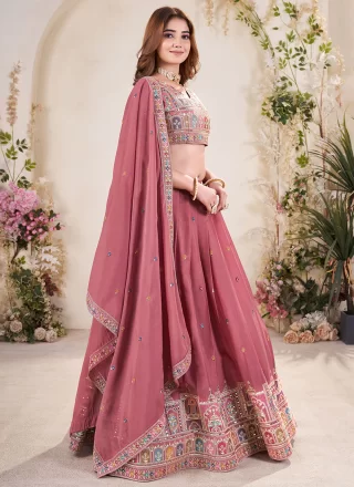 Embroidered, Sequins and Zari Work Georgette Lehenga Choli In Pink and Rust Colour