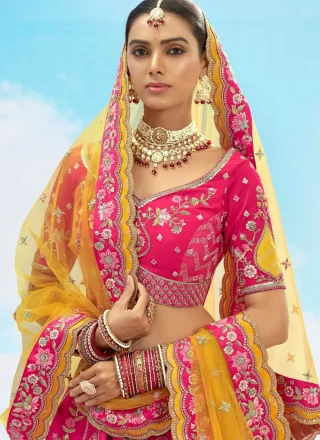 Embroidered, Sequins, Stone, Thread and Zari Work Silk Lehenga Choli In Rani Color