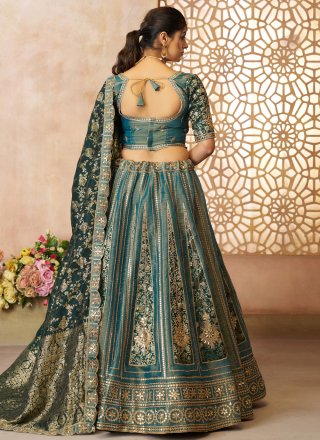 Embroidered, Stone, Thread, Weaving and Zari Work Net A - Line Lehenga Choli In Morpeach for Ceremonial