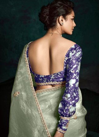 Fancy Fabric Classic Saree with Embroidered and Zari Work