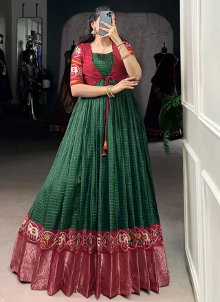 Fancy Fabric  Designer Gown with Patola Print and Weaving Work