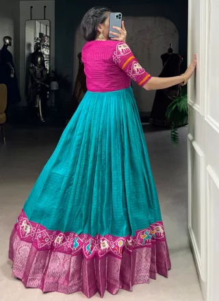 Firozi Fancy Fabric Patola Print and Weaving Work Gown