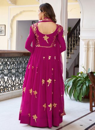 Fuchsia Faux Georgette Floor Length Salwar Suit with Embroidered, Sequins and Zari Work