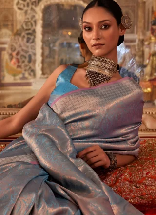 Gleaming Blue Handloom Silk Trendy Saree with Weaving and Zari Work