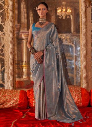 Gleaming Blue Handloom Silk Trendy Saree with Weaving and Zari Work