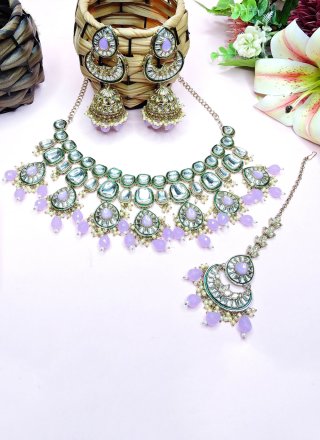 Invigorating Mauve Diamond, Moti and Stone Work Necklace Set