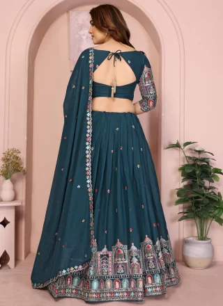 Morpeach and Teal Georgette Embroidered and Zari Work Lehenga Choli