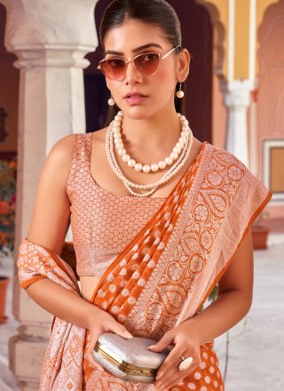 Orange and Rust Georgette Trendy Saree with Weaving Work for Ceremonial