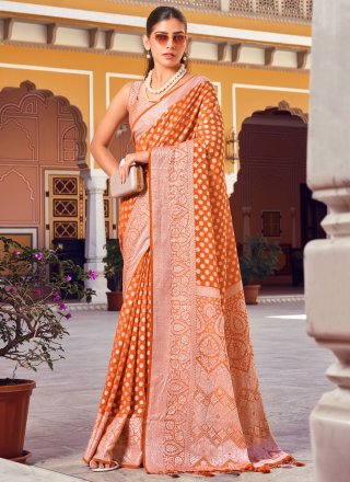 Orange and Rust Georgette Trendy Saree with Weaving Work for Ceremonial