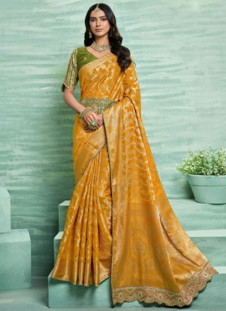 Patch Border, Embroidered, Lace, Weaving and Zari Work Silk Contemporary Sari In Mustard