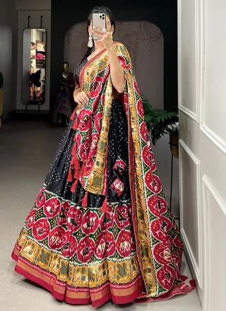 Patola Print Work Tussar Silk A - Line Lehenga Choli In Black for Festival