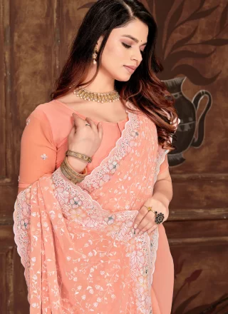 Peach and Pink Georgette Traditional Saree