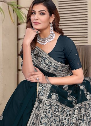 Perfect Morpeach and Teal Georgette Traditional Saree with Embroidered, Resham and Zari Work