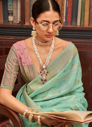 Pleasing Turquoise Viscose Trendy Saree with Woven and Zari Work