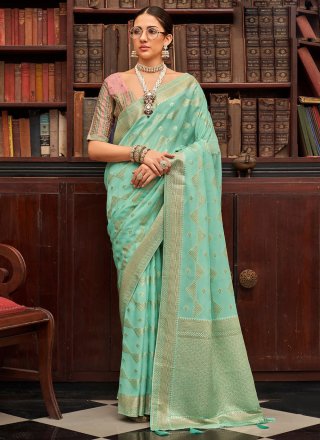 Pleasing Turquoise Viscose Trendy Saree with Woven and Zari Work