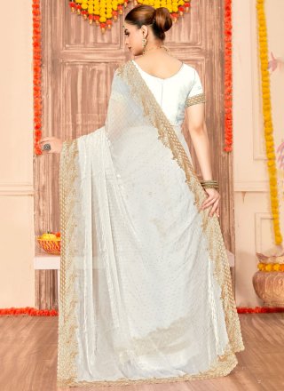 Scintillating White Fandy Designer Saree with Embroidered, Swarovski and Zari Work
