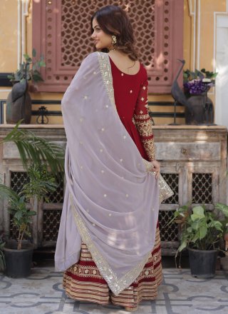 Staring Maroon and Rani Faux Georgette  Designer Gown with Embroidered, Sequins and Zari Work