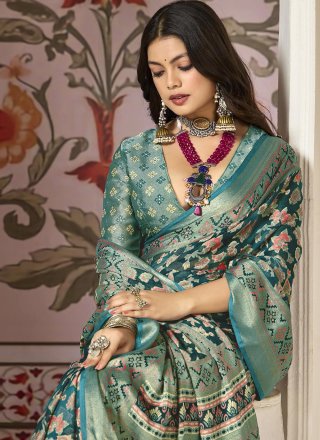 Teal Silk Floral Patch and Woven Work Trendy Saree for Ceremonial