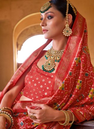 Thrilling Red Silk Designer Saree with Patola Print Work