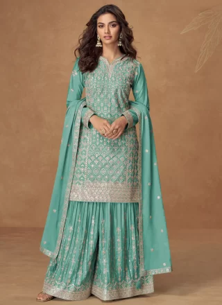 Turquoise Chinon Palazzo Salwar Suit with Embroidered and Zari Work