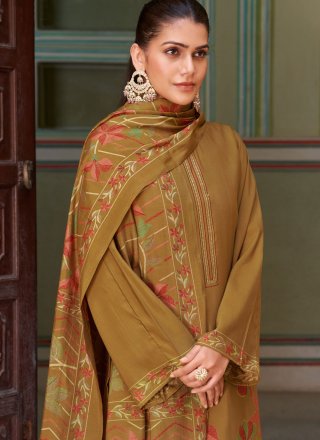 Voluptuous Brown Muslin Salwar Suit with Embroidered and Foil Print Work