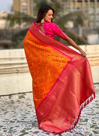 Voluptuous Orange Patola Silk Classic Sari
