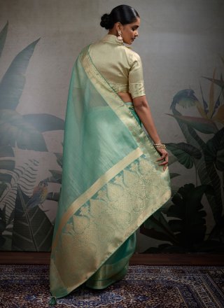 Woven and Zari Work Tissue Trendy Saree In Turquoise