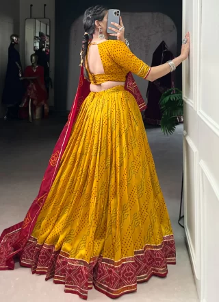 Yellow Silk Bandhej, Lace and Print Work A - Line Lehenga Choli