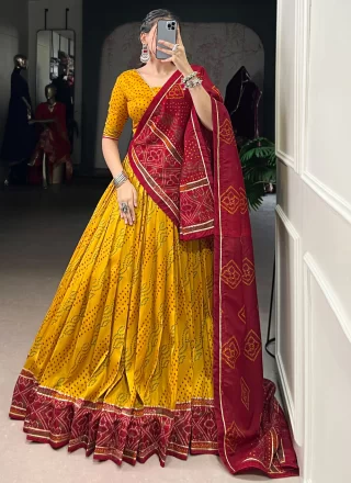 Yellow Silk Bandhej, Lace and Print Work A - Line Lehenga Choli