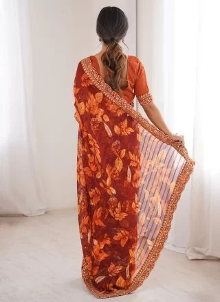 Embroidered and Print Work Fancy Fabric Trendy Saree In Orange Colour