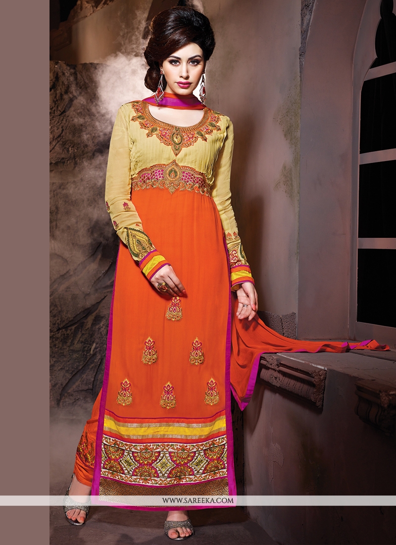 Orange embroidery work churidar suit Orange embroidery work churidar suit