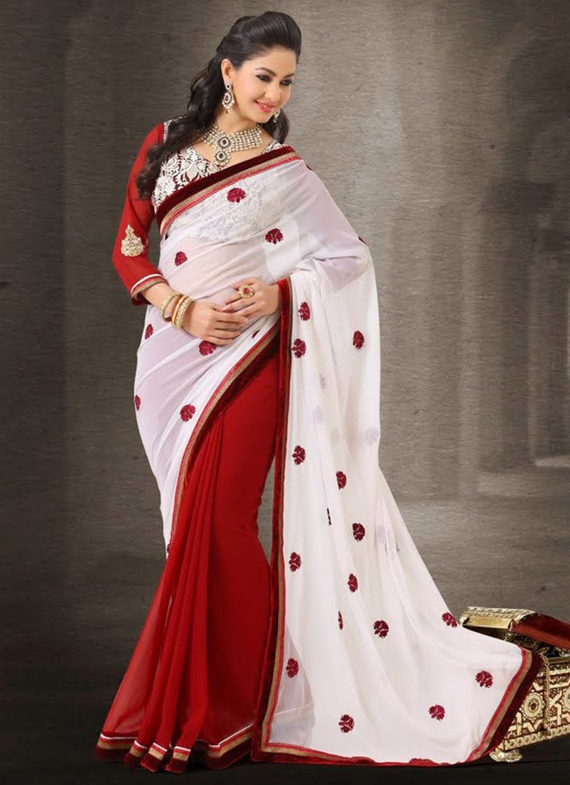 Poorna nails yet another ethnic look in a half saree by Kowshiki Couture!