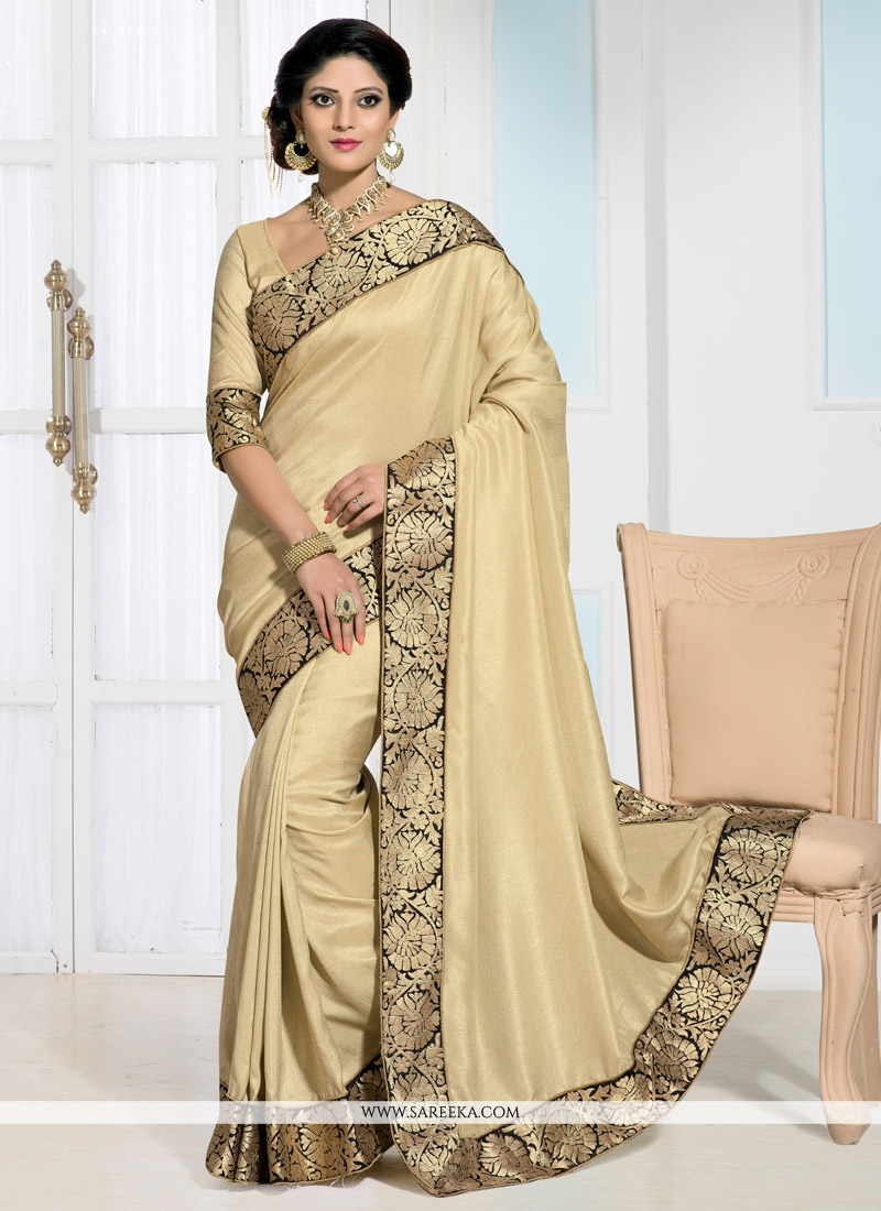 cream colour net saree
