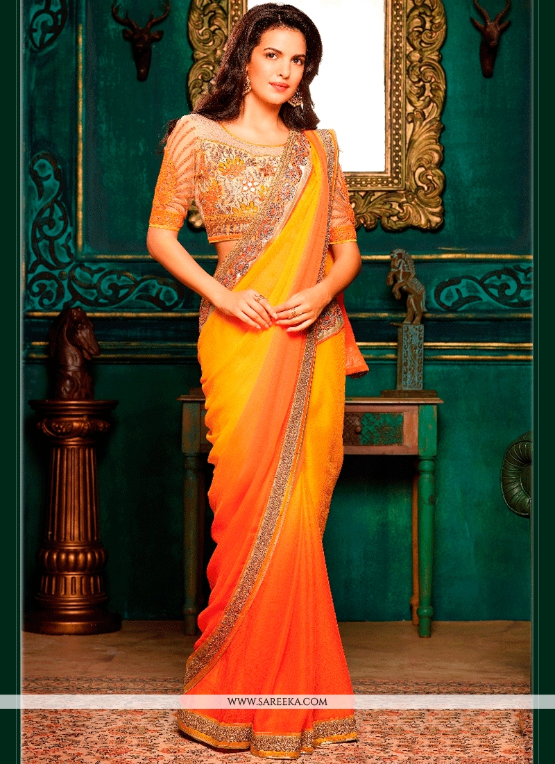 Gorgeous Actress Sonakshi Sinha Yellow and Orange Saree - MiaIndia.com