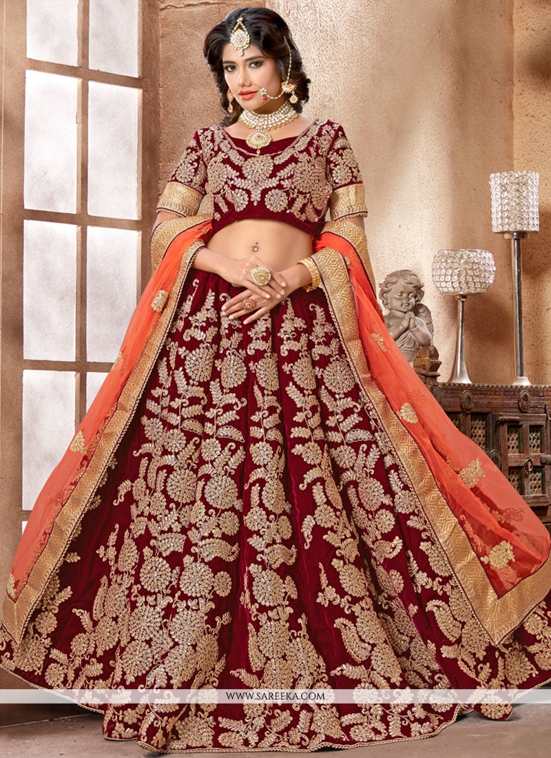 Maroon Velvet Reception Wear Resham Work Lehenga Choli - Zakarto