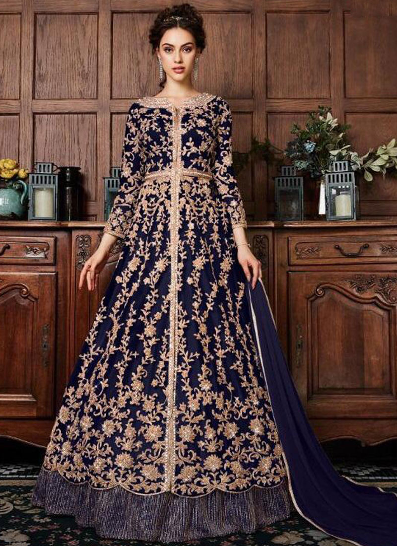 Label'M - Bride Meera in a royal blue lehenga with applique work blouse and  antique embellishments. A line skirt with embroidery net and detachable  trail highlow skirt with applique border makes the