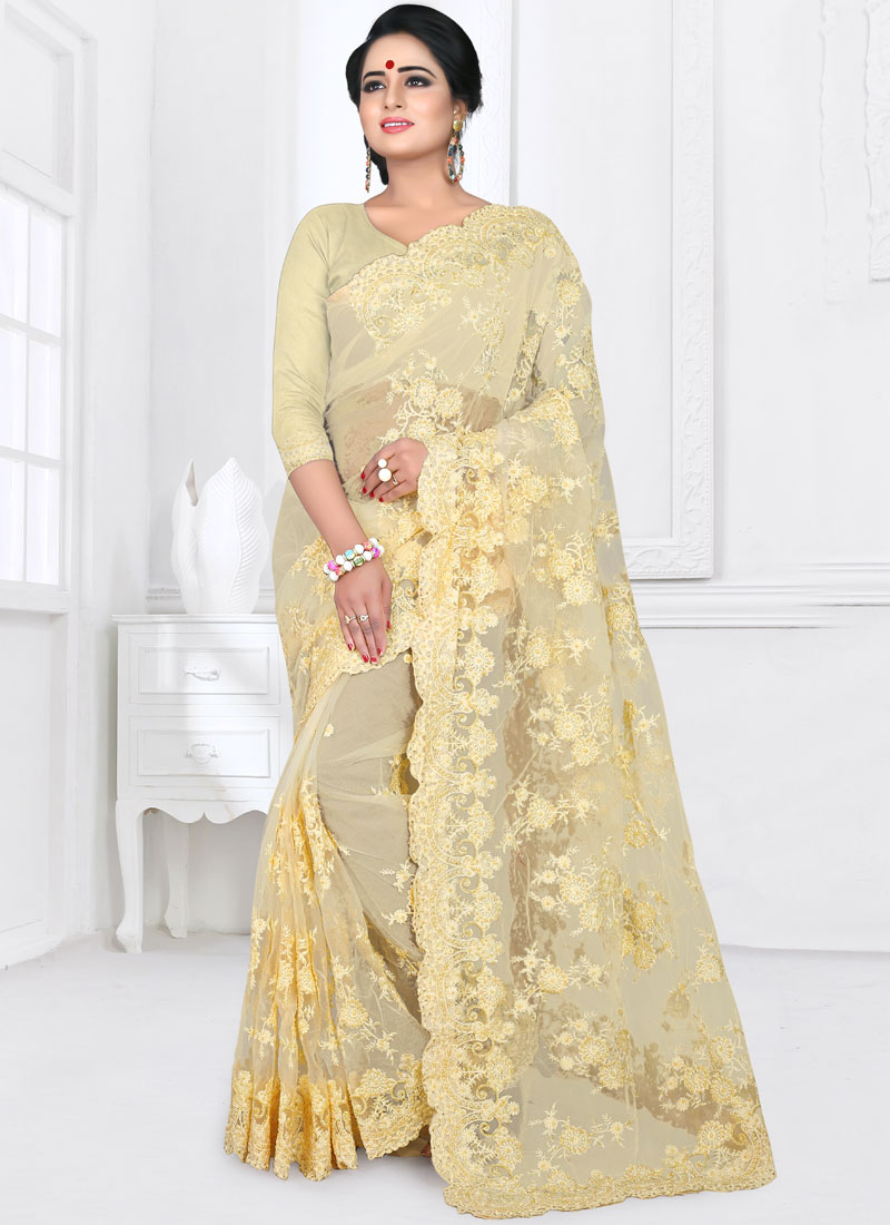 cream colour net saree