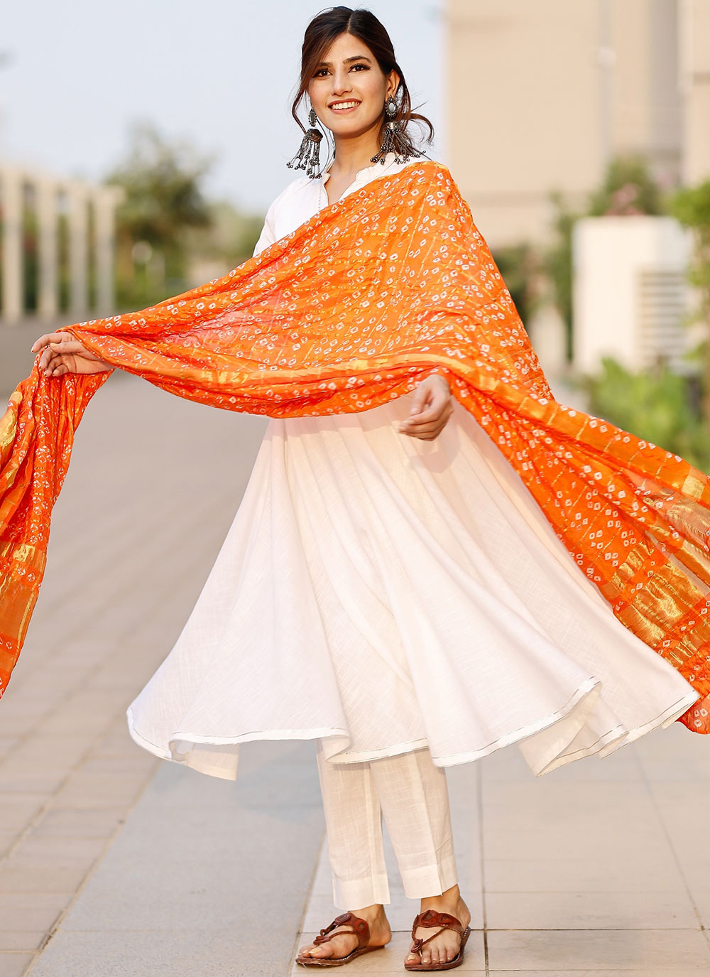 White dress hot sale with orange dupatta